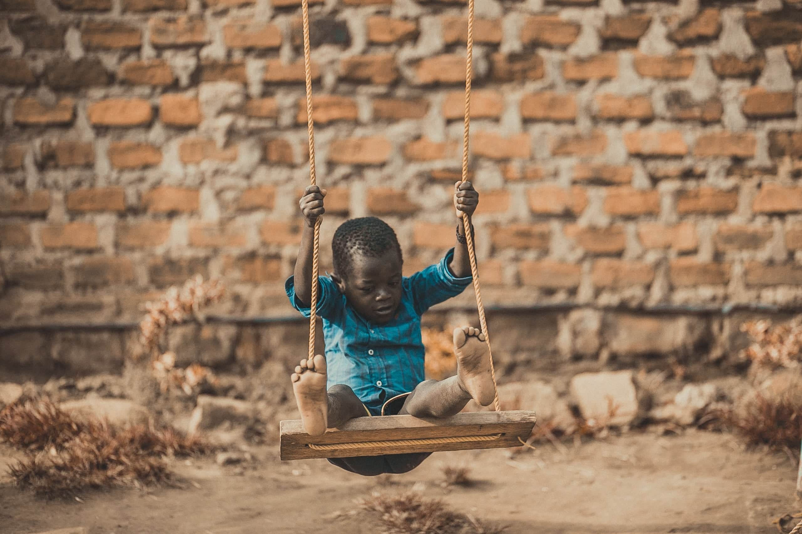 africa-boy-brick-wall-1686467 africa-boy-brick-wall-1686467